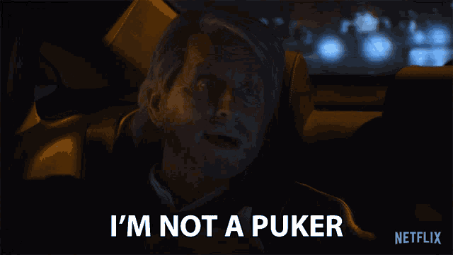 a man in a car with the words i 'm not a puker
