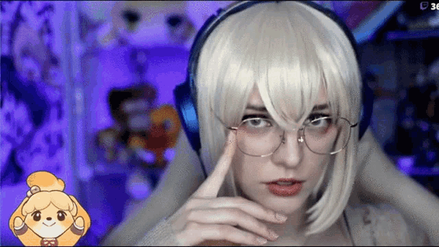 a woman wearing a wig and glasses is looking at the camera