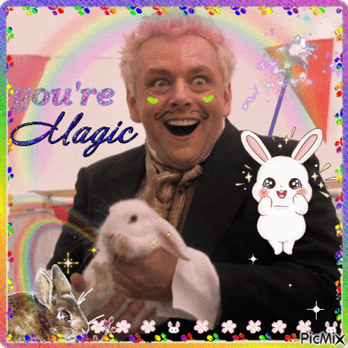 a picture of a man holding a rabbit with the words " you 're magic " on it