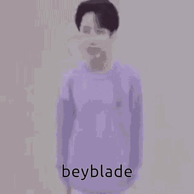 a purple background with the word beyblade written on it
