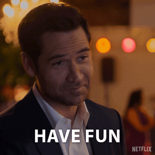 a man in a suit says " have fun " in a netflix advertisement