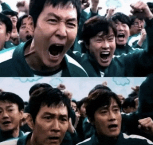 a group of people with their mouths open and their hands in the air