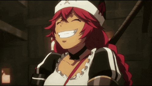 a close up of a girl with red hair laughing