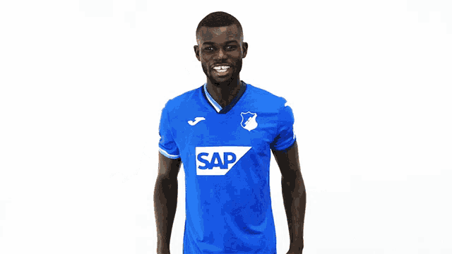 a man wearing a blue shirt with the word sap on the front