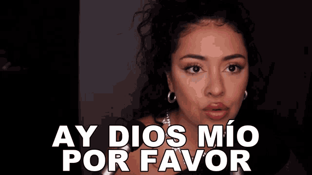 a woman with her eyes closed has ay dios mio por favor written on her face