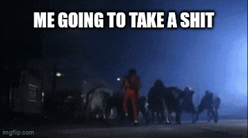 a group of people standing in a dark room with the words me going to take a shit