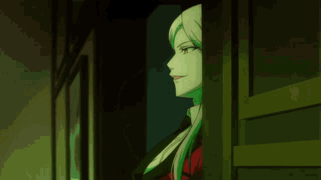 a woman with long blonde hair is standing in a doorway