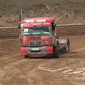 a red renault truck with the number 36 on the front