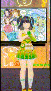 a girl in a green dress stands in front of a tv