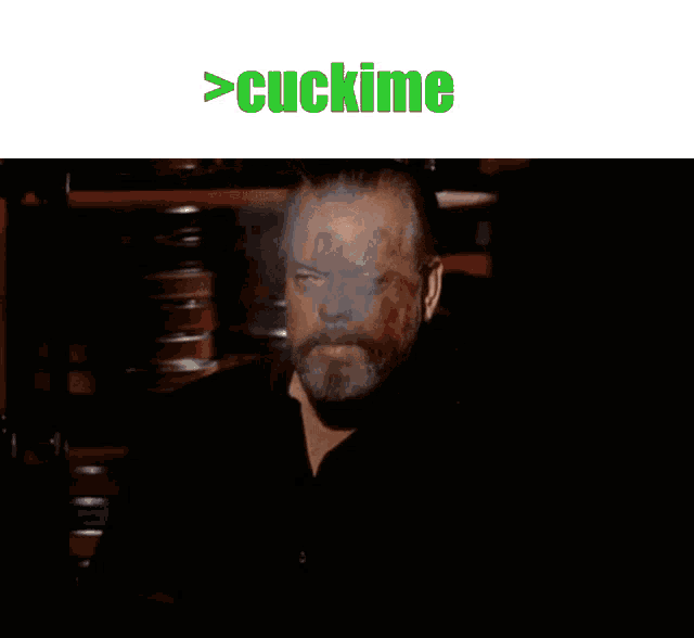 a man smoking a cigar with the words cuckime above him