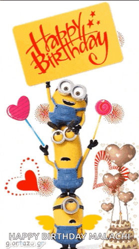a group of minions holding a sign that says happy birthday