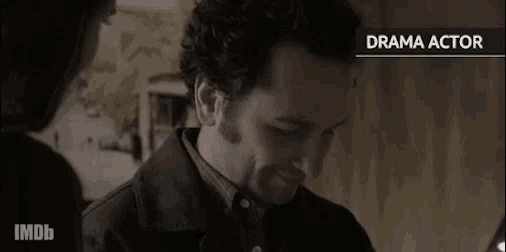 a close up of a man 's face with the words " drama actor " behind him