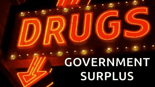 a neon sign that says drugs government surplus on it