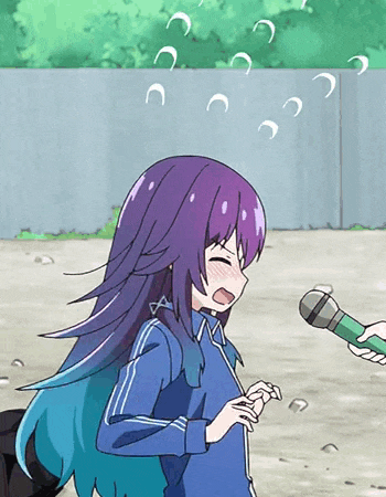 a girl with purple hair is being interviewed by a man with a green microphone