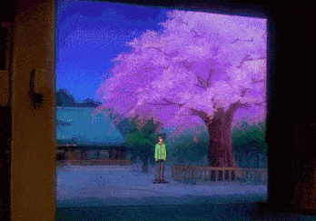 a man in a green jacket stands in front of a purple tree