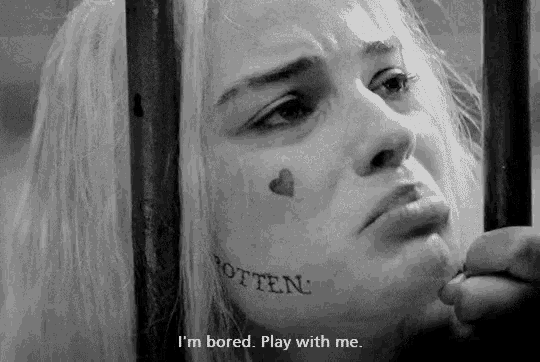 a woman with a tattoo on her face that says rotten on it