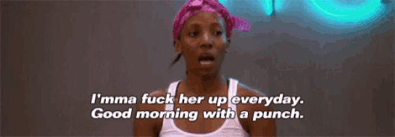 a woman with a pink headband is saying i 'mma fuck her up everyday .