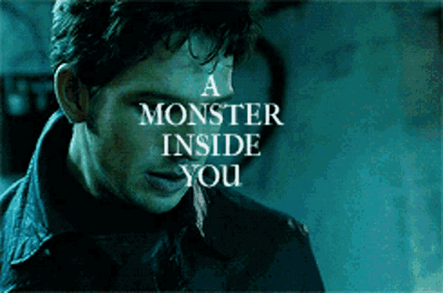 a man in a dark room with a monster inside you written on his face