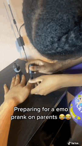a person is preparing for an emo prank on their parents