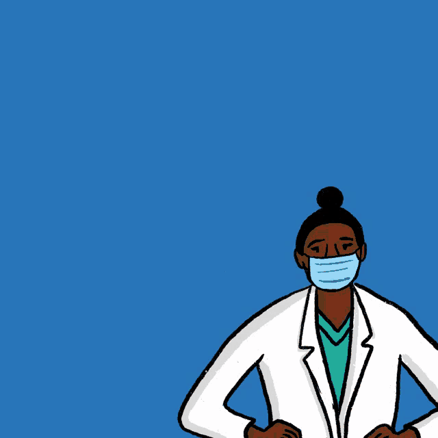 a group of doctors wearing face masks and holding up their fist