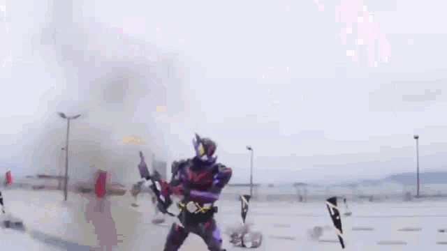 a purple robot is standing in a parking lot with a sword in his hand .