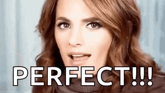 a close up of a woman 's face with the words `` perfect !!! '' written on it .