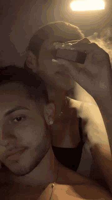 a man and a woman are taking a picture together