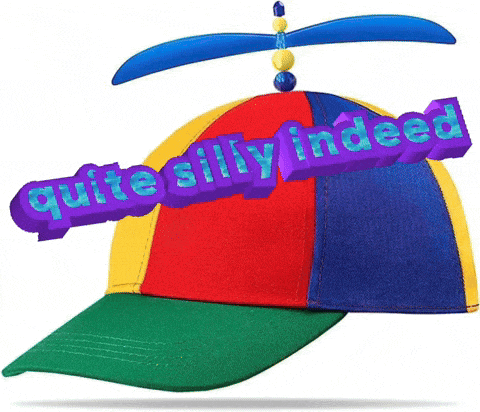 a colorful hat with a propeller on top that says quite silly indeed