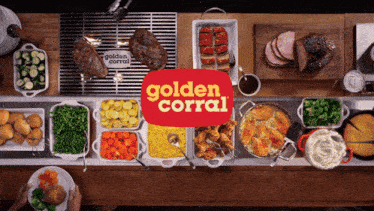 a table full of food with a golden corral logo in the middle