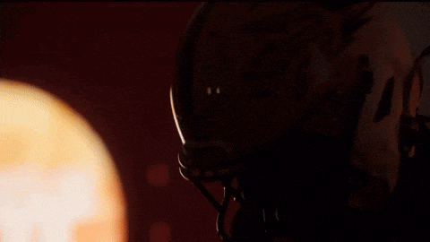 a close up of a football player 's helmet with a signature on it that says gsdf