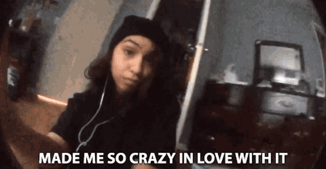 a girl taking a selfie with the words " made me so crazy in love with it "