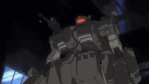 a robot is flying through the air in a dark room with smoke coming out of it .