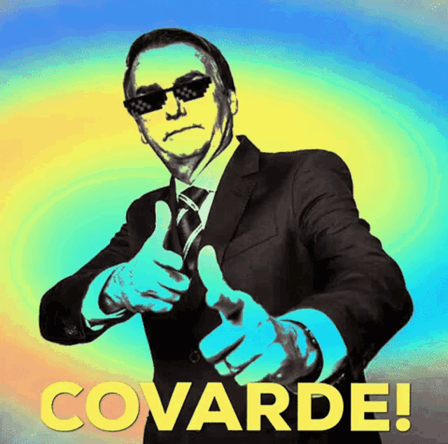 a man in a suit and tie is giving a thumbs up with the word covarde written below him