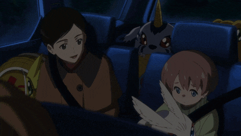 a couple of anime characters are sitting in a car