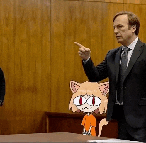 a man in a suit and tie is pointing at a cartoon cat with red eyes