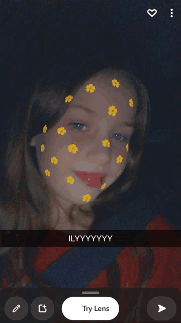 a girl with yellow flowers on her face says ilyyyyyy