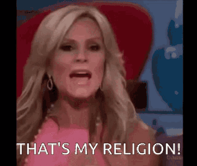 a woman in a pink dress is screaming and saying `` that 's my religion ! ''
