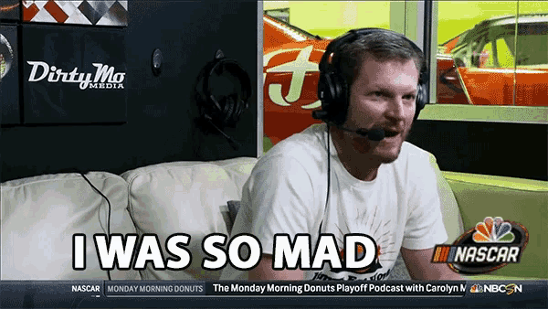 a man wearing headphones and a shirt that says i was so mad