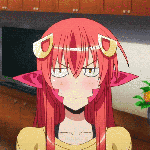 a girl with red hair has a yellow letter d on her ears
