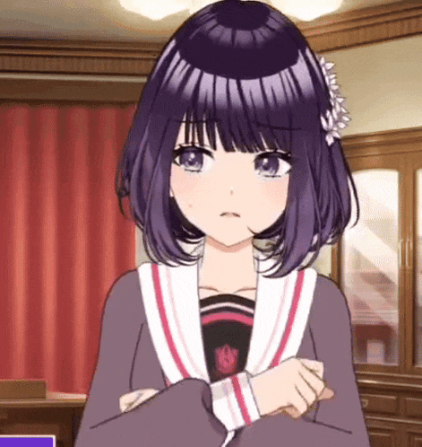a girl with purple hair is standing in a room with her arms crossed and a flower in her hair .