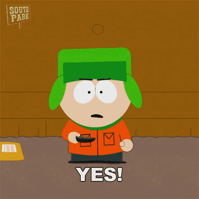 a cartoon character from south park is holding a remote control and says yes