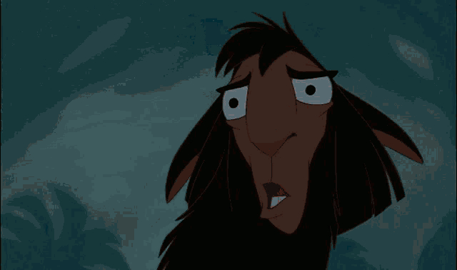 a close up of a cartoon character 's face with a surprised look on his face