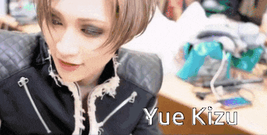 a close up of a person with the name yue kizu written on the bottom