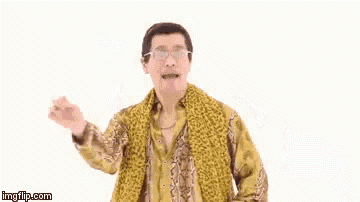 a man wearing glasses and a leopard print shirt is holding an apple pen .
