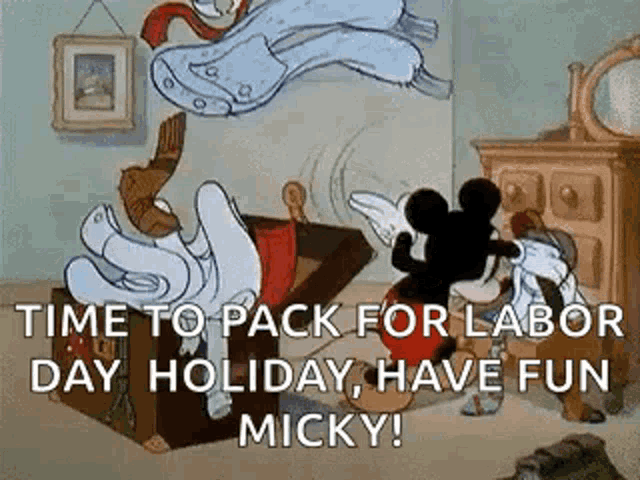 mickey mouse is sitting in a suitcase in a cartoon .