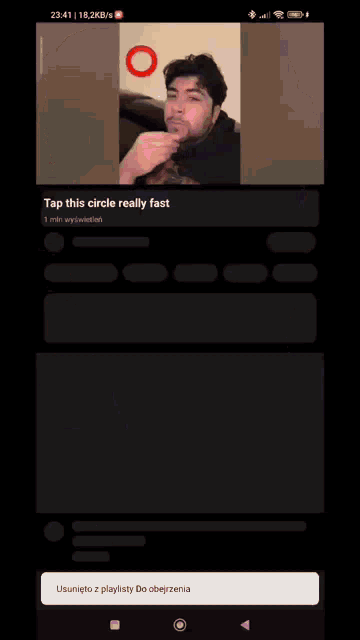 a phone screen that says tap this circle really fast at the top