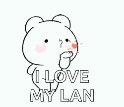 a cartoon bear is holding a heart in his hand and saying `` i love my lan '' .