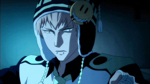 a person with a smiley face on their hat