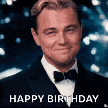 a man in a tuxedo and bow tie is smiling with the words happy birthday above him