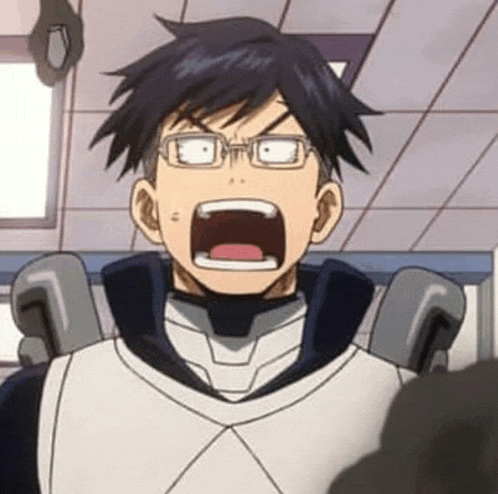 a close up of a person wearing glasses making a funny face with their mouth open .